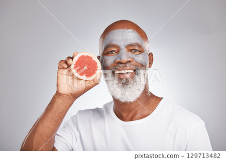 Grapefruit, face mask and portrait of man, healthy skincare and beauty, wellness and makeup of anti aging, detox or natural facial cleaning. Happy face, studio male model and vitamin c fruits of glow Grapefruit, face mask and portrait of man, healthy skincare and beauty, wellness and makeup of anti aging, detox or natural facial cleaning. Happy face, studio male model and vitamin c fruits of glow 129713482