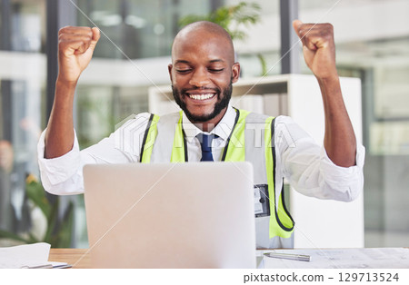 Construction engineer man, laptop and celebration in office for success, contract and happy for email communication. Black man, engineering and construction worker with winning bonus, goal and profit 129713524