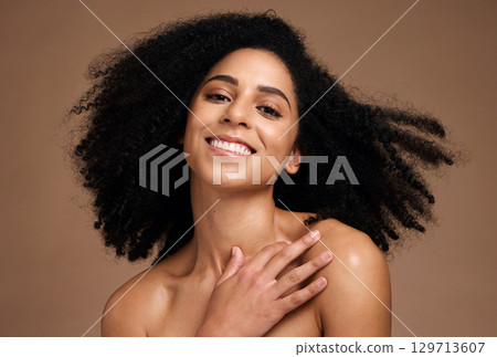Black woman, beauty portrait and happiness for skincare wellness, natural afro hair care and cosmetics dermatology in brown background studio. African model, smile and luxury self care body glow 129713607