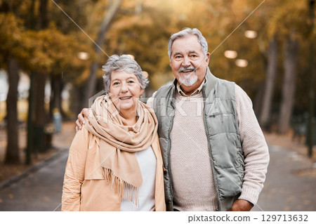 Portrait, love and senior couple in nature, bonding and retirement together. Romantic, mature man and elderly woman walking, loving and peace for marriage, forest and fresh air outdoor, smile and hug 129713632