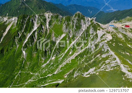 Aerial view of Senjojiki Cirque, with its steep ridgeline and hiking trails Aerial view of Senjojiki Cirque, with its steep ridgeline and hiking trails 129713707