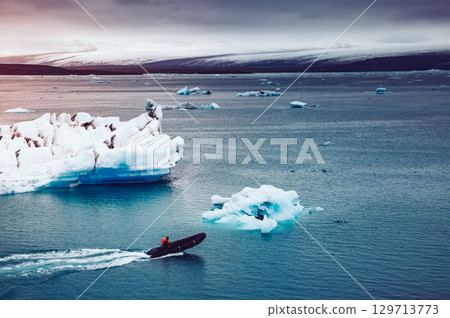 Large pieces of the iceberg in Jokulsarlon lagoon. Vatnajokull national park, Iceland. Large pieces of the iceberg in Jokulsarlon lagoon. Vatnajokull national park, Iceland. 129713773