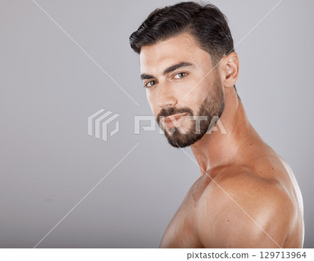 Man, studio portrait and skincare with beauty, cosmetics and wellness by studio backdrop with natural glow. Model, self care and healthy aesthetic for cosmetic self love, body care and radiant facial 129713964