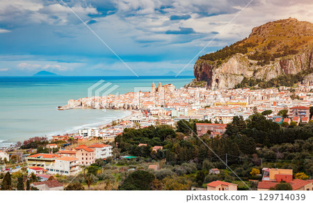 An impressive view of the famous resort Cefalu. Location place Tempio di Diana, Sicilia, Italy. An impressive view of the famous resort Cefalu. Location place Tempio di Diana, Sicilia, Italy. 129714039