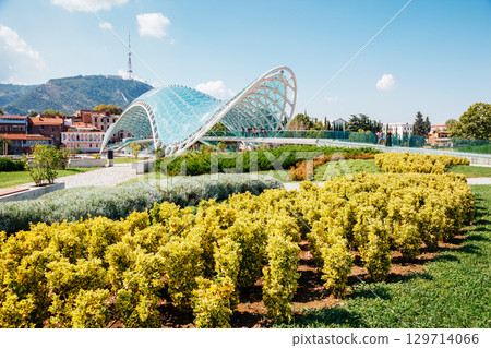 Captivating scene of the bridge of Peace in Tbilisi town. Captivating scene of the bridge of Peace in Tbilisi town. 129714066