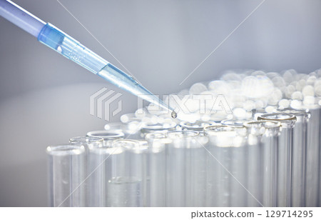 Science, test tubes and syringe for research, experiment or project in chemistry laboratory. Glass vials, innovation and chemical liquid for scientific innovation or analysis in a pharmaceutical lab. 129714295
