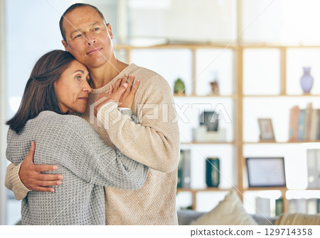 Love, romance and married with a couple hugging while standing in their home together with mockup or flare. Affection, bonding and hug with a mature man and woman embracing in their domestic house Love, romance and married with a couple hugging while standing in their home together with mockup or flare. Affection, bonding and hug with a mature man and woman embracing in their domestic house 129714358