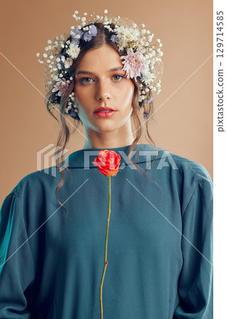 Spring, fashion and portrait of woman with flowers on brown background for beauty, cosmetics and makeup. Creative art, aesthetic and girl with floral crown for beauty products, skincare and wellness 129714585