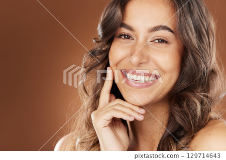 Beauty model, face skincare or hairstyle on studio background in Brazil self care, healthcare wellness or luxury haircare. Portrait, smile or happy woman and brunette color or makeup cosmetics Beauty model, face skincare or hairstyle on studio background in Brazil self care, healthcare wellness or luxury haircare. Portrait, smile or happy woman and brunette color or makeup cosmetics 129714643