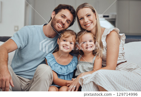 Portrait, mother and father with girls, smile and bonding on sofa for break, quality time and happiness. Love, family and parents with daughters, loving and joy for childcare, mama and dad with kids. 129714996
