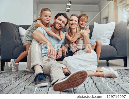 Happy family, bonding parents or children hug in Canada house or home living room in trust, relax support or love security. Portrait, smile or kids with mother, father or man and woman embrace 129714997