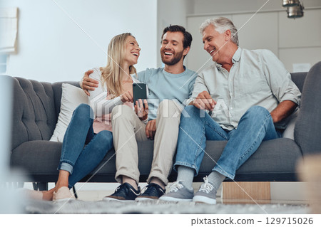 Family, phone and relax on sofa in home, having fun and bonding. Tech, cellphone and happy man, woman and grandfather with mobile smartphone laughing at comic meme on social media or funny video. Family, phone and relax on sofa in home, having fun and bonding. Tech, cellphone and happy man, woman and grandfather with mobile smartphone laughing at comic meme on social media or funny video. 129715026