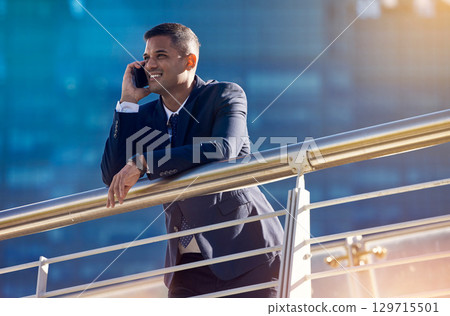 Success, city or businessman on a phone call networking, talking or speaking of growth ideas or our vision. Smile, mindset or happy investor in communication or discussion about news or mission goals 129715501