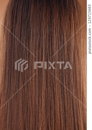 Woman headshot, back and brown hair style in studio keratin treatment, Brazilian dye color or healthcare wellness. Zoom, texture and brunette strands with straight detail on model with healthy growth Woman headshot, back and brown hair style in studio keratin treatment, Brazilian dye color or healthcare wellness. Zoom, texture and brunette strands with straight detail on model with healthy growth 129715665