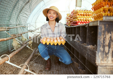 Asian woman, chicken eggs or tray for farming sales, agriculture export or sustainability growth success. Portrait, smile or happy poultry farmer and dairy product, protein bird stock or healthy food 129715768
