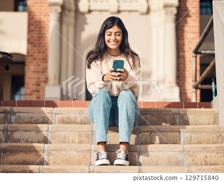 Student, smile or girl with phone on stairs for communication, 5g network or social media news app reading outdoor. Happy, mobile or woman with smartphone for networking, comic website or blog post Student, smile or girl with phone on stairs for communication, 5g network or social media news app reading outdoor. Happy, mobile or woman with smartphone for networking, comic website or blog post 129715840