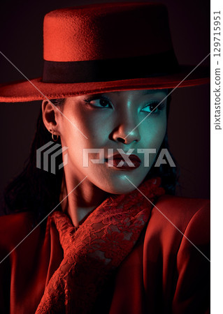 Dark, seductive and vintage woman thinking of fashion, red clothes and creative against a dark black studio background. Mysterious, elegant beauty and face of a model in the 90s with an idea 129715951