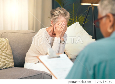 Crying, sad or old woman in counseling with a psychologist for depression, burnout or mental health problems. Checklist, consulting or depressed senior lady frustrated with anxiety stress in therapy 129716059