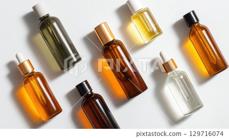 luxurious collection of natural oil serums. These powerful elixirs are formulated to hydrate, protect, and revitalize your skin, leaving it with healthy, luminous glow luxurious collection of natural oil serums. These powerful elixirs are formulated to hydrate, protect, and revitalize your skin, leaving it with healthy, luminous glow 129716074