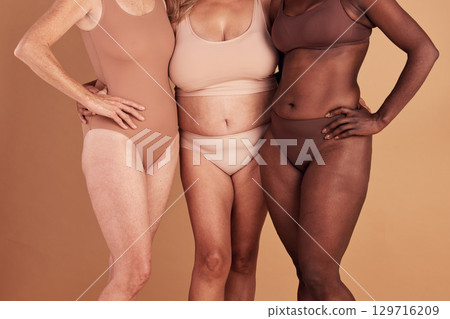 Diversity, closeup or women with body positivity, wellness or support on brown studio background. Multiracial, females or ladies with solidarity, skincare or confident for natural beauty or community 129716209