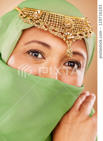 Eyes, hijab and Muslim, woman with Islamic fashion and face zoom with veil and jewelry, beauty and microblading portrait. Cosmetic lens, religion freedom and wellness with fashion model and vision. 129716283