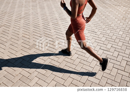 Running, runner and woman with fitness in city, training for marathon and exercise with cardio workout in Seattle. Urban, run outdoor with health and wellness, active life and athlete shadow in sport Running, runner and woman with fitness in city, training for marathon and exercise with cardio workout in Seattle. Urban, run outdoor with health and wellness, active life and athlete shadow in sport 129716838