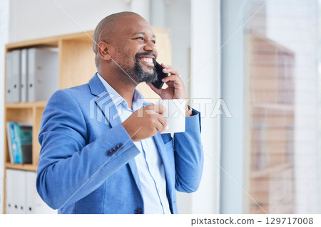 Success, communication and black man on a phone call in office talking, in discussion and virtual conversation. Leader, corporate business and male entrepreneur networking on smartphone with coffee 129717008