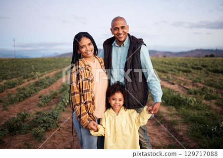 Black family, smile and portrait at agriculture farm, bonding and having fun together. Love, agro sustainability and care of father, mother and girl, kid or child on field for harvest and farming. 129717088