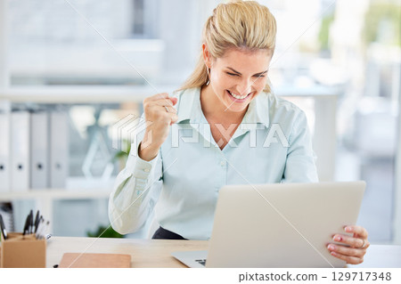 Success, winner and business woman on a laptop in celebration of job promotion or good news. Happy, celebrate and professional corporate employee with achievement working on computer in modern office 129717348