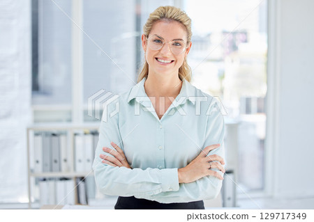 Vision, success and portrait of business woman in organized, corporate and modern workplace with crossed arms. Leadership, startup and female entrepreneur in office with confidence, ideas and goals Vision, success and portrait of business woman in organized, corporate and modern workplace with crossed arms. Leadership, startup and female entrepreneur in office with confidence, ideas and goals 129717349