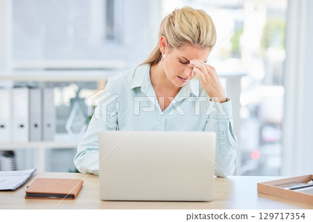 Mental health, laptop and woman with burnout headache from feedback review of financial portfolio, investment research or trading report. Problem, economy and trader stress over stock market crash 129717354