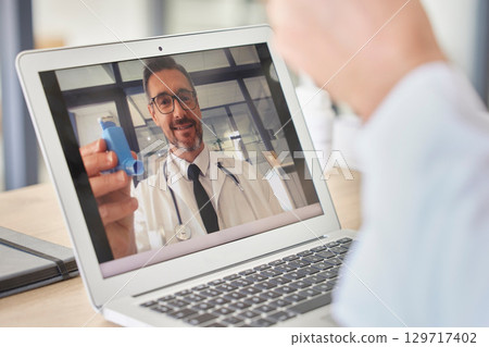 Asthma, laptop and doctor consulting in video call for telehealth service, advisory and virtual help or support. Screen, cardiology zoom call and healthcare man with breathe product or medicine talk Asthma, laptop and doctor consulting in video call for telehealth service, advisory and virtual help or support. Screen, cardiology zoom call and healthcare man with breathe product or medicine talk 129717402