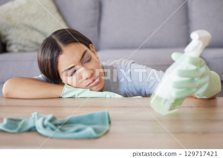 Detergent, housekeeping and woman tired from cleaning furniture, counter and table in apartment living room. Housework, domestic chores and exhausted woman with spray bottle cleaning products in hand Detergent, housekeeping and woman tired from cleaning furniture, counter and table in apartment living room. Housework, domestic chores and exhausted woman with spray bottle cleaning products in hand 129717421