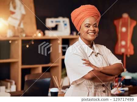 Fashion, designer and african or black woman in portrait for small business startup, creative career or textile industry in a workshop studio. Fabric, manufacturing and retail clothes of proud woman Fashion, designer and african or black woman in portrait for small business startup, creative career or textile industry in a workshop studio. Fabric, manufacturing and retail clothes of proud woman 129717499