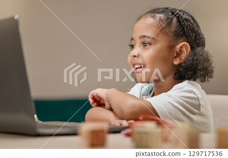 Young child, laptop and learning with online education and school, girl student and study at home with e learning, academic video or online class. Virtual, digital and development with education. Young child, laptop and learning with online education and school, girl student and study at home with e learning, academic video or online class. Virtual, digital and development with education. 129717536