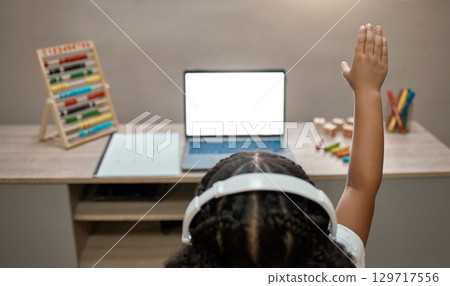 Online education, blank screen and girl on computer raise hand for school and education. Black kid, study and student on technology with question on school children app in house on web with mockup 129717556