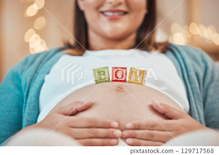 Pregnancy, blocks and hands on stomach for love, childcare and motherhood support. Pregnant woman, happy baby development and mom wellness, healthy maternity growth or calm, relax lifestyle in home Pregnancy, blocks and hands on stomach for love, childcare and motherhood support. Pregnant woman, happy baby development and mom wellness, healthy maternity growth or calm, relax lifestyle in home 129717568
