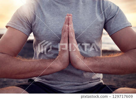 Prayer, hands or praying in yoga meditation exercise or body training with peace, gratitude or chakra healing energy. Nature, God or zen yogi relaxing in a calm lotus pose for spiritual mindfulness Prayer, hands or praying in yoga meditation exercise or body training with peace, gratitude or chakra healing energy. Nature, God or zen yogi relaxing in a calm lotus pose for spiritual mindfulness 129717609