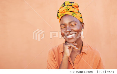 Beauty, smile and black woman, happy and face for skincare cosmetic product with orange wall. Happiness, head scarf and fashion African girl feeling soft skin texture with mockup space outdoor 129717624