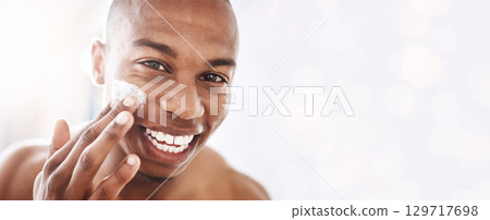 Black man, skincare portrait and cream by mockup space, smile or happy for cosmetic beauty by blurred background. African gen z model, skin health and natural glow with product placement mock up 129717698