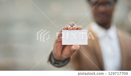 Logo, man and business card for networking, opportunity and sales growth with mockup, space and ceo. Male, hand and leader with brand development, black paper and design for company and branding 129717709