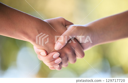 Handshake, support and hands for support in sports, fitness and exercise in outdoor park. Teamwork, collaboration and women shaking hands for friendship, thank you and community in sport training 129717720