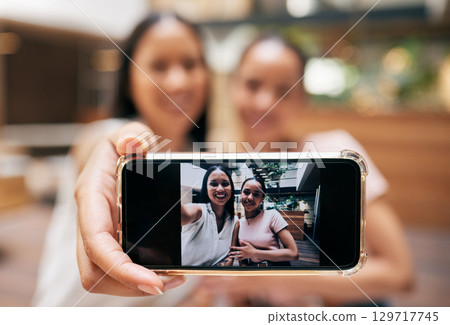 Phone, friends and woman with selfie on screen enjoying shopping, quality time and weekend at the mall. Friendship, social media and happy girls taking picture for memories on holiday on smartphone Phone, friends and woman with selfie on screen enjoying shopping, quality time and weekend at the mall. Friendship, social media and happy girls taking picture for memories on holiday on smartphone 129717745