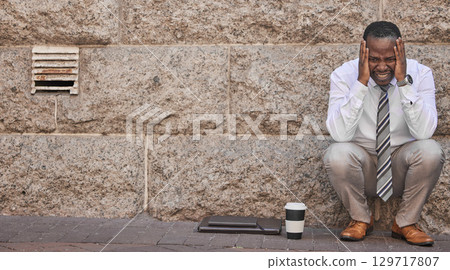 Business, depression and sad black man in city after failure, financial crisis or mistake mockup. Mental health, anxiety or stress, unemployed or unhappy businessman in street thinking about job loss 129717807