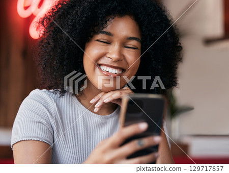 Woman, cafe and phone or wifi search in a restaurant for social media meme or content with joy. Coffee shop, mobile internet and female customer browsing social network for communication or text Woman, cafe and phone or wifi search in a restaurant for social media meme or content with joy. Coffee shop, mobile internet and female customer browsing social network for communication or text 129717857