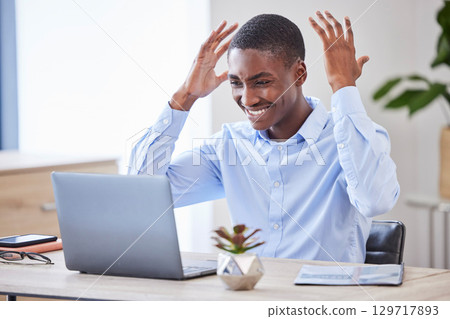 Winner, laptop and business black man in office for sales, profit and bonus announcement, email communication and success. Wow, winning and corporate worker with finance trading on pc technology app 129717893