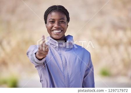Portrait, thumbs up and black woman outdoor, training and exercise for fitness, power and wellness. Young female Nigerian, athlete and healthy girl with hand gesture for achievement, goals or workout Portrait, thumbs up and black woman outdoor, training and exercise for fitness, power and wellness. Young female Nigerian, athlete and healthy girl with hand gesture for achievement, goals or workout 129717972
