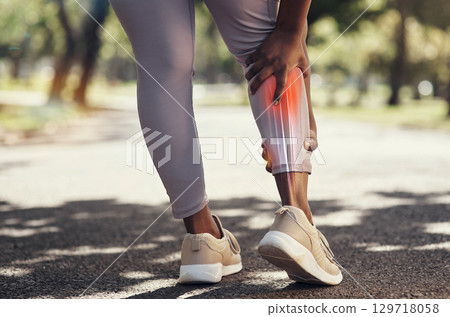 Woman, fitness and pain or injury on legs while running on outdoor road for exercise, workout and training. Sport person with red anatomy calf overlay for and massage for joint, accident or arthritis Woman, fitness and pain or injury on legs while running on outdoor road for exercise, workout and training. Sport person with red anatomy calf overlay for and massage for joint, accident or arthritis 129718058