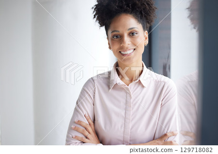 Business woman, arms crossed and leaning on window in marketing office, advertising startup or Brazilian branding company. Portrait, smile or happy creative designer with innovation, vision or ideas 129718082