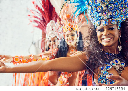 Brazil, dance and carnival with a woman group at a festival during a performance of tradition, culture or heritage. Portrait, event and celebration with female dancers dancing in rio de janeiro 129718264